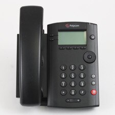 A photo of a Polycom VVX 101 IP phone with a black body, a 2.5-inch LCD display, a numeric keypad, a speakerphone, and a headset jack.