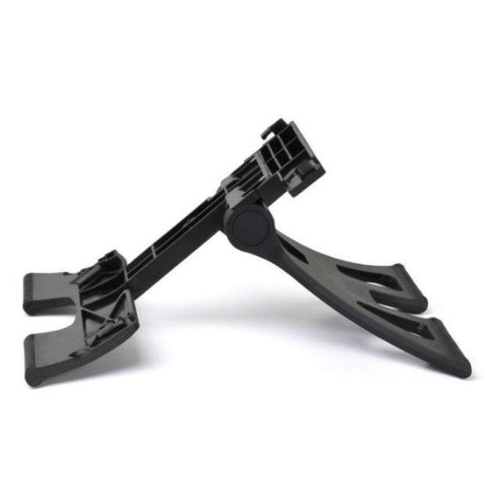 A photo of a Polycom desk stand with a black body, a rectangular shape, and four rubber feet.