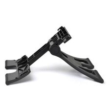 A photo of a Polycom desk stand with a black body, a rectangular shape, and four rubber feet.