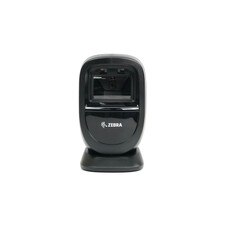 Zebra DS9308-SR4U2100AZE barcode scanner on a retail counter, showcasing its sleek design and scanning capabilities.