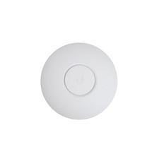 A white Ubiquiti UniFi nanoHD wireless access point with four antennas and a blue LED ring on a white background